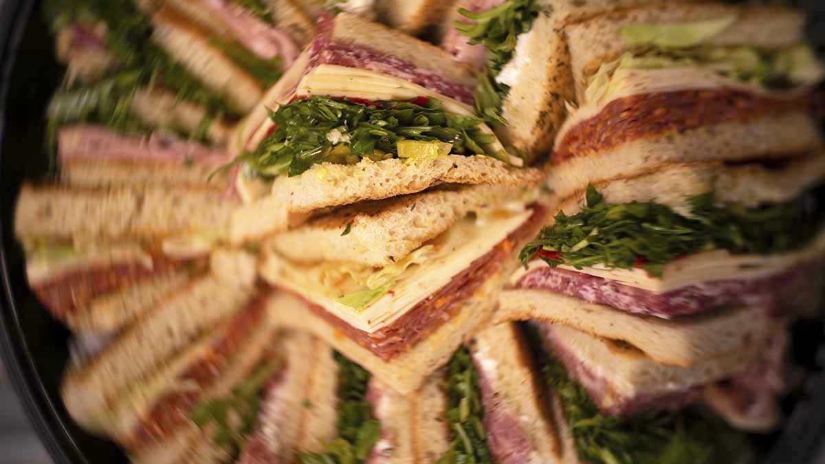 Club sandwich display assembled in interactive charcuterie workshop