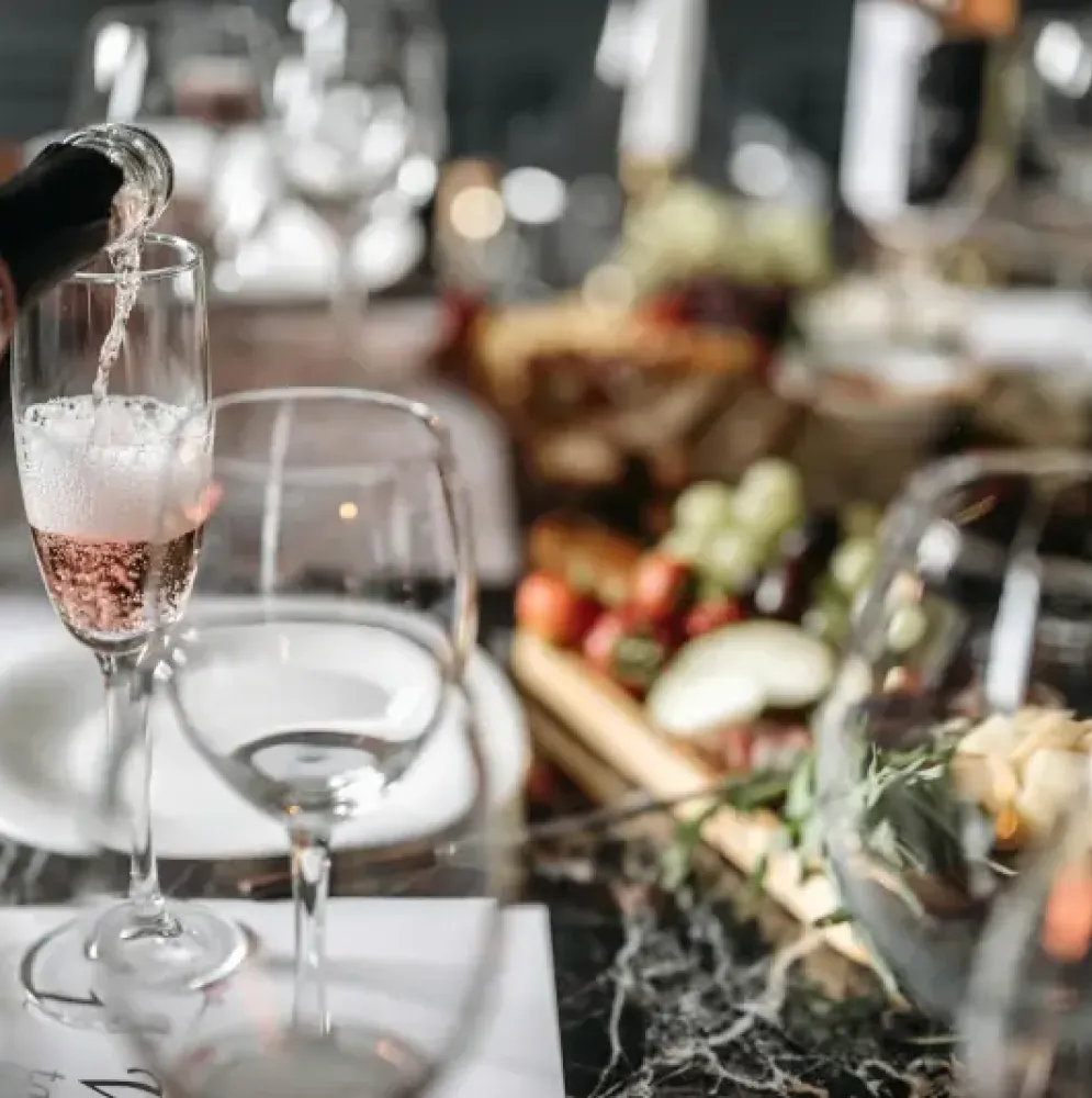Table with charcuterie boards for holiday celebration